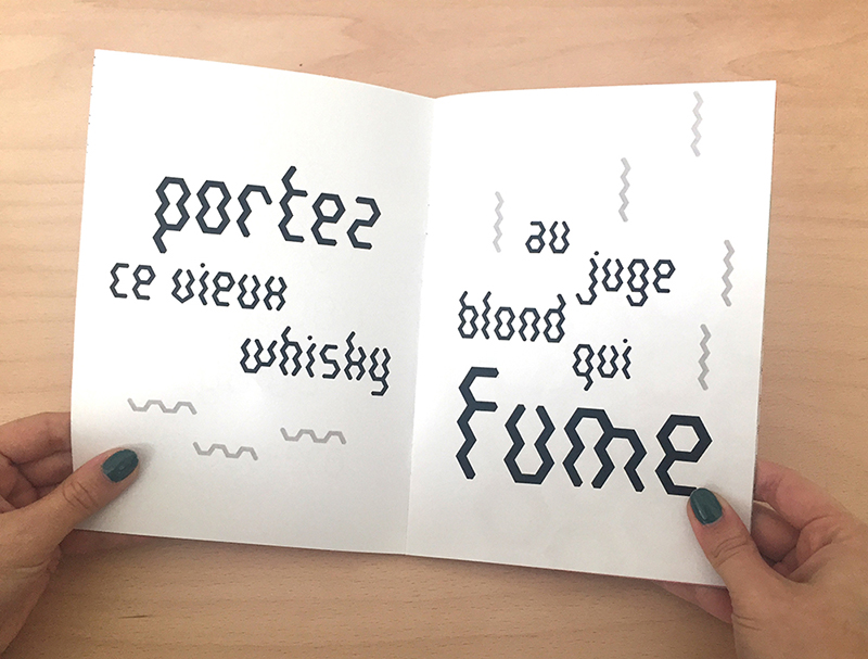 Typographie formée par des hexagones à l'image de l'écrou